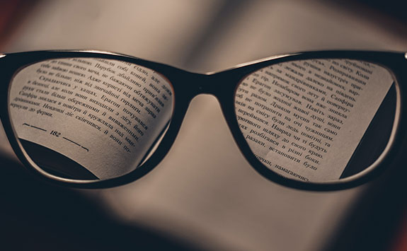 Book and reading glasses